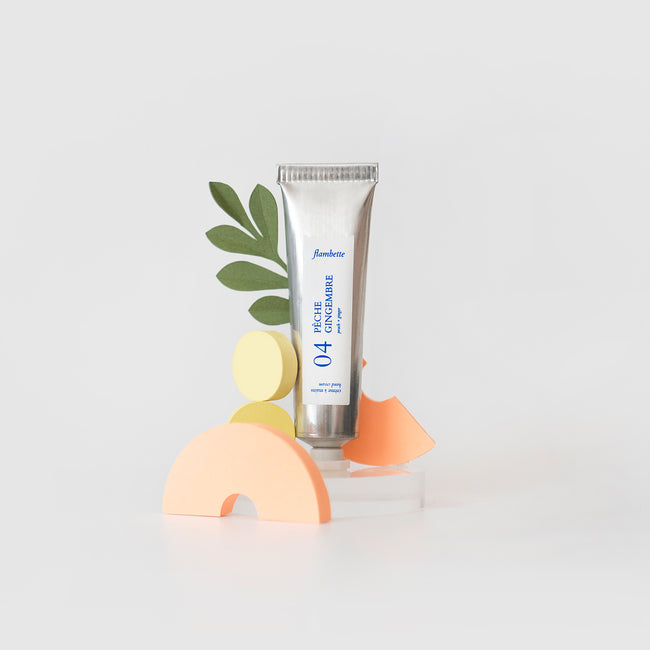 tube de crème à main hydratante pêche gingembre
